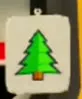 Silver Pine air freshener with a green tree on a silver tag.