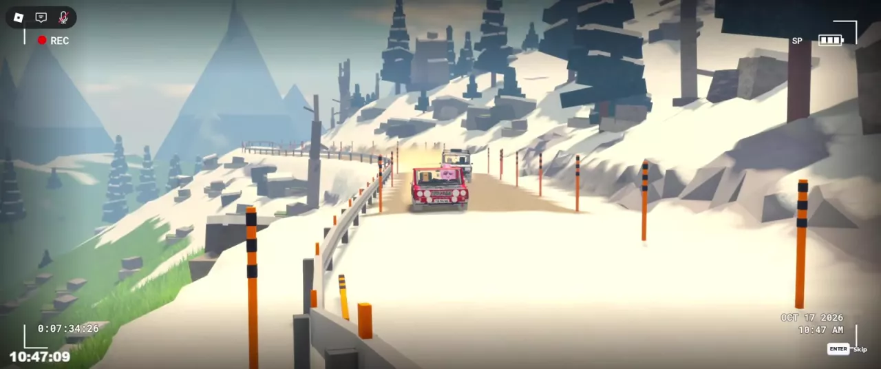 Rally cars on an Alpine Pass mountain road bordered by snow, guardrails and roadside poles.